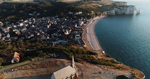 Drone view of a church above the cliffs of Etretat normandy France Stock Footage 221921540