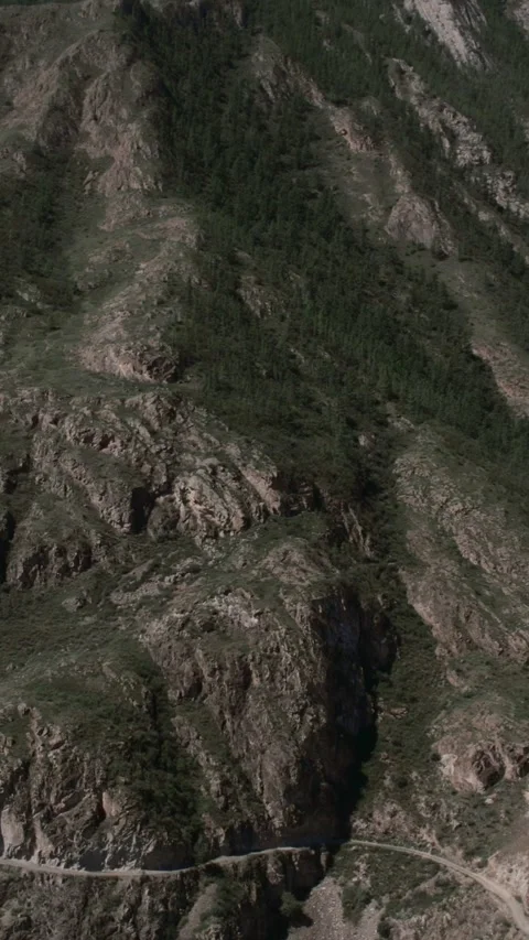 Drone view of Chuy Tract mountain highway winding through Altai Republic, Russia Video stock 346555824