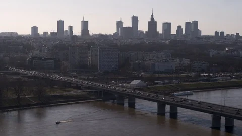 Drone view of city, bridge, river and motorboat Stock Footage 89665313