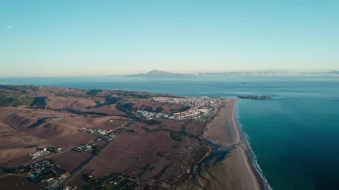 Drone view of the city of Tarifa and Africa Stock Footage 230450276