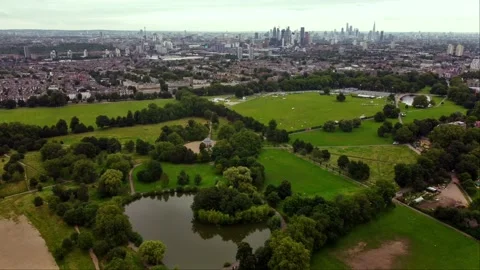 Drone view of Clapham Common with London in the background. Stock Footage 189514065
