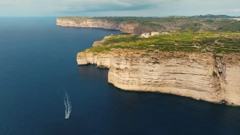 Drone view of cliffs on Gozo island. Rocks, sea. Malta island Stock Footage 329986395