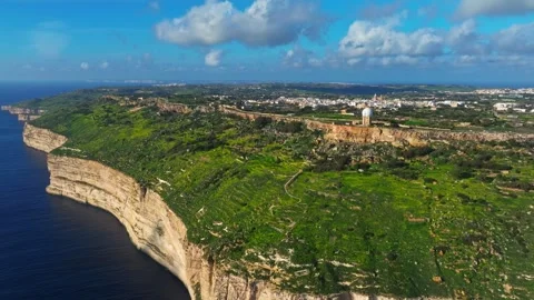 Drone view of cliffs on Maltese island. Green hills, Mediterranean sea Stock Footage 301877475