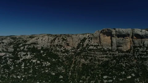 Drone view of cliffs on a sunny day Stock Footage 115947786