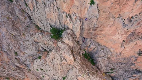 "Drone View of Climbers Preparing for Wingsuit Jump" Stock Footage 309206124