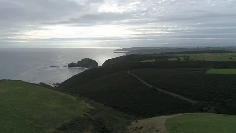 Drone view of cloudy sunset in Cnatbria, Spain 4K Stock Footage 126352317