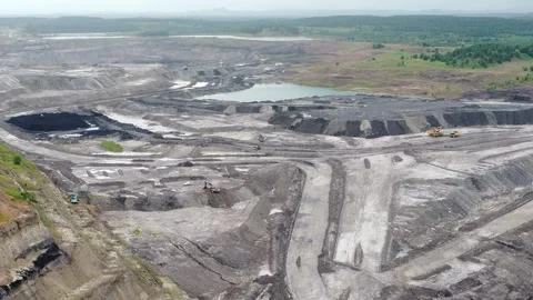 Drone view of coal mining activities, coal transport trucks loading and spr.. Stock Footage 327995096