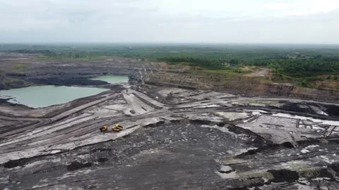 Drone view of coal mining activities, coal transport trucks loading and spr.. Stock Footage 328710359