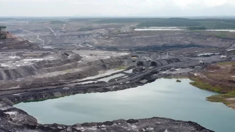 Drone view of coal mining activities, coal transport trucks loading and spr.. Stock Footage 328710554