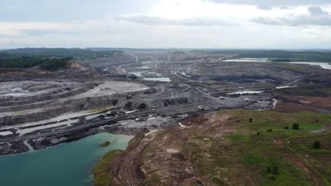 Drone view of coal mining activities, coal transport trucks loading and spr.. Stock Footage 328970189