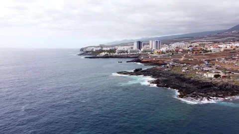 Drone view of the coast and ocean in Playa Paraíso, Tenerife, Canary Islands Stock Footage 303257870