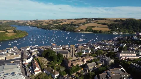 Drone view of coastal South Devon town Salcombe on a sunny summer evening Video stock 345440063