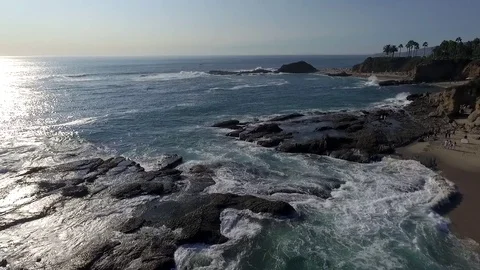 Drone view of coastline and beach of Laguna Beach aerial fly over Stock Footage 73719073