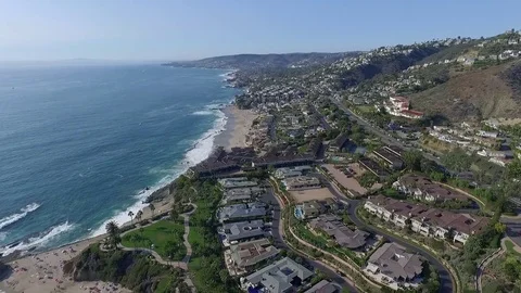 Drone view of coastline and beach of Laguna Beach aerial flyover Stock Footage 73719147