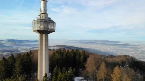 Drone view with concrete tower at hazy winter day from Uetliberg Zurich's l.. Stock Footage 231232625