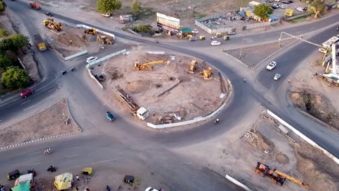 Drone View of Construction Machinery and vehicles during circle ring road C.. Stock Footage 244662316