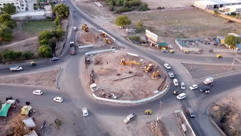 Drone View of Construction Machinery and vehicles during circle ring road C.. Stock Footage 244664777