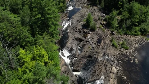 Drone View - Cool flight up Wilson's Falls looking down with Dam - Bracebrid Stock Footage 314233831