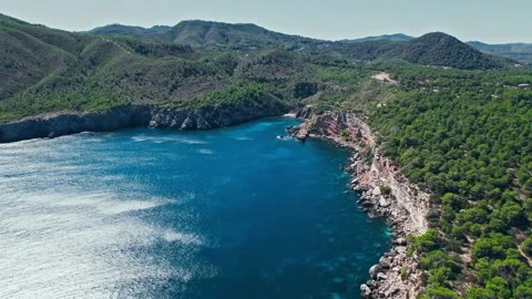 Drone view of corals in turquoise transparent mediterranean sea in Ibiza, Spain. Видео 203830325