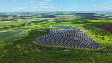 Drone view of countryside solar panel array demonstrating sustainability. Aerial Video stock 340773481
