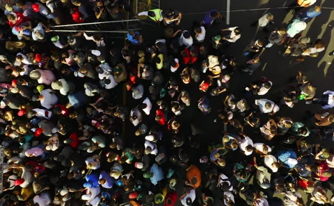 Drone view, crowd and group of people in city on street for convention, festival Stock Footage 243189542