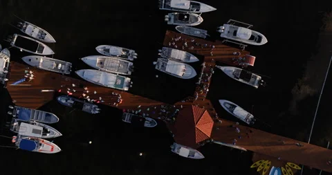 Drone View of Crowded Boat Dock at Fishing Tournament During Caribbean Sunset Stock Footage 300361496