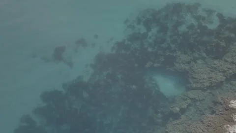 Drone view of crystal-clear sea water in Cala Morell, Menorca - D Log Stock Footage 246535627