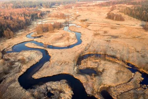 Drone view of curved river at springtime Stock Photos