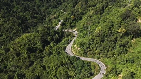 Drone view of curvy, jungle road, Mae Hong Son loop, Thailand Stock Footage 328848875