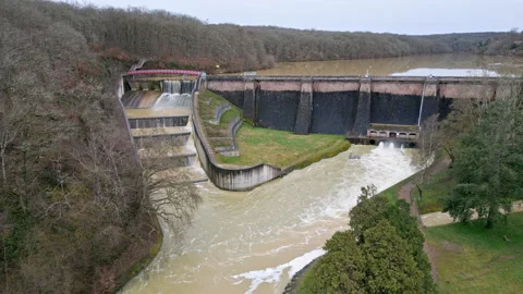 Drone view dam spillway and water discharge Stock Footage 328970280