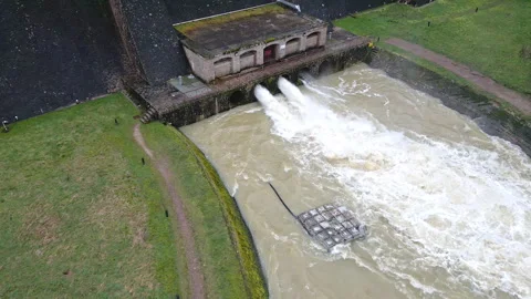 Drone view dam spillway and water discharge Stock Footage 328971901