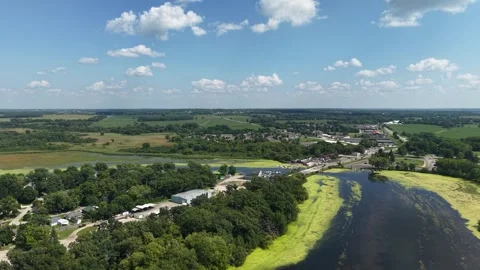 Drone View of Delavan, Lake Lawn in Wisconsin USA, Green Landscape and Traffic Stock Footage 346649933