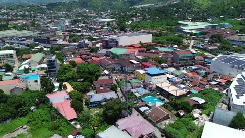 Drone view of dense cityscape and residential district in Cebu Talisay 143 Stock Footage 334722479