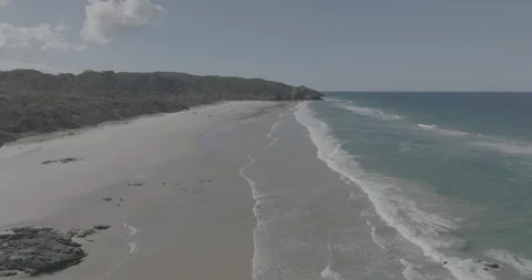 Drone view of deserted beach in Byron Bay, Australia Stock Footage 264770270