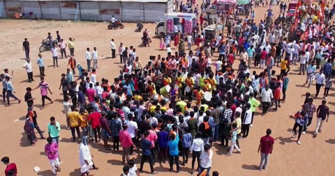 Drone View of Devotees Playing Drums Before Lord Ganesha During Immersion Stock Footage 340084092