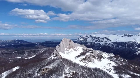 Drone view of difficult access mountain peak for climbers during winter Stock Footage 171911047