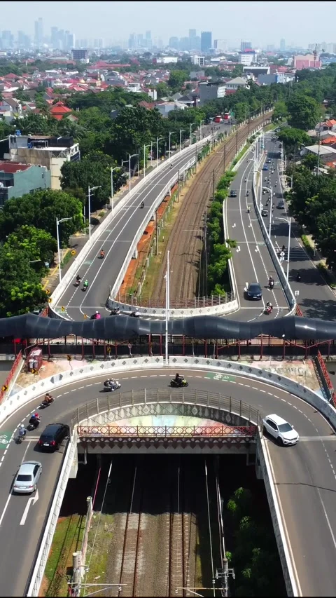 Drone view of a double flyover with a U-turn Stock Footage 324172310
