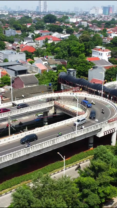 Drone view of a double flyover with a U-turn Stock Footage 324182604