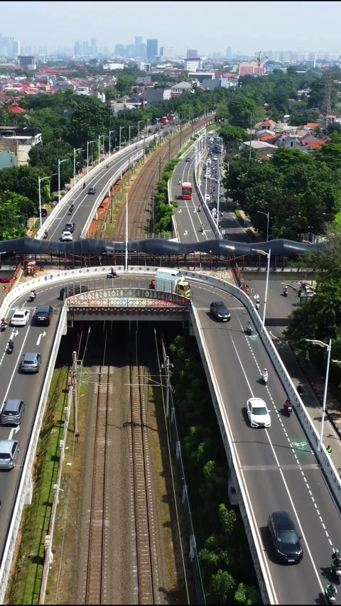 Drone view of a double flyover with a U-turn Stock Footage 324187917