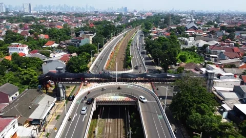Drone view of a double flyover with a U-turn Stock Footage 324189021