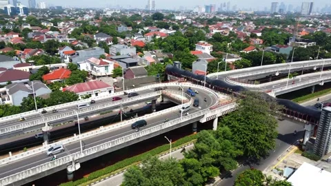 Drone view of a double flyover with a U-turn Stock Footage 324189789