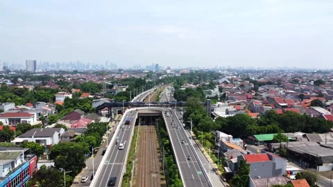 Drone view of a double flyover with a U-turn and a straight road Stock Footage 324196414