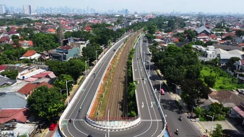 Drone view of a double flyover with a U-turn Stock Footage 324196921