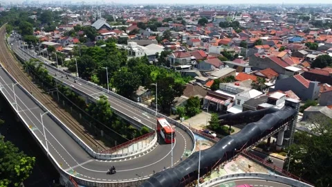 Drone view of a double flyover with a U-turn and a straight road Stock Footage 324201056