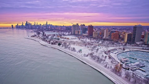 Drone view of downtown Chicago’s Loop during a quiet winter sunrise. Stock Footage 332131686