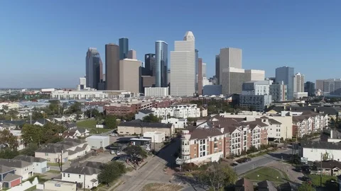 Drone view of downtown Houston skyline on a clear sky day Stock Footage