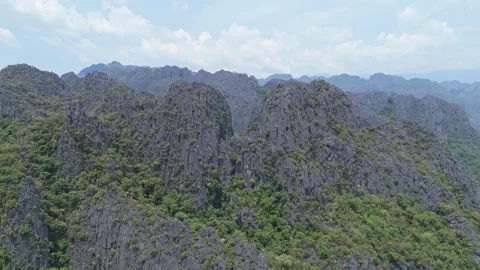 Drone View of Dramatic Karst Cliffs in Khammouane, Laos Video stock 330594837