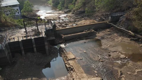 Drone View of Dried Riverbed and Dam Structure Kerala India Video stock 309076801