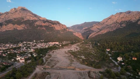 Drone view of a dry riverbed in a mountain canyon Stock Footage 318366810