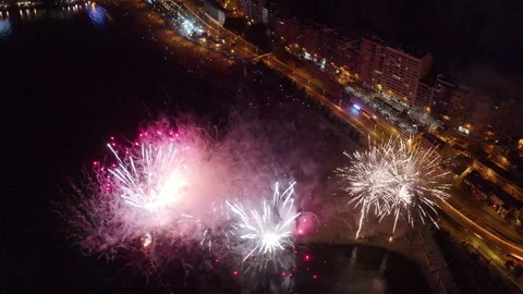 Drone view during the fireworks on the beach in Alicante, Spain. Stock Footage 325912499